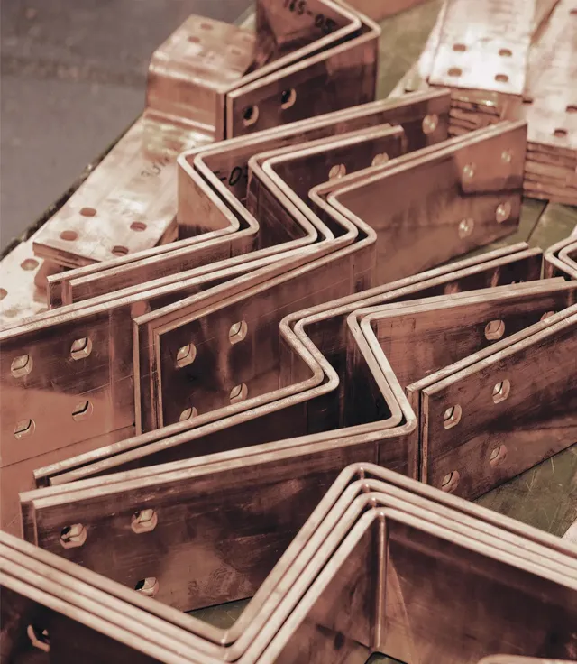 Bent copper busbars