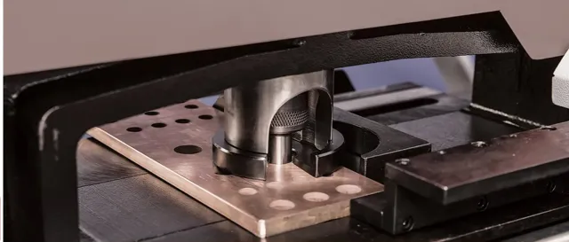 Punched busbar on the puncher table
